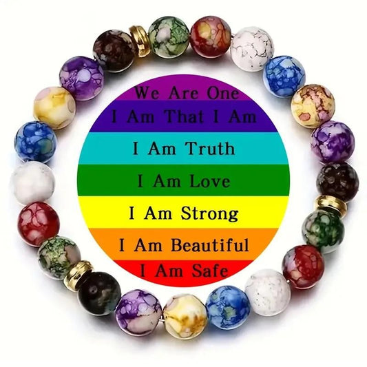 Multicolored beaded bracelet with a rainbow circle of affirmations on a white background